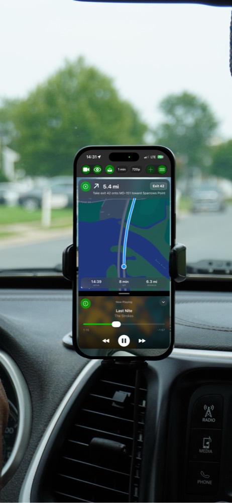 GoDash showing navigation with a compact now-playing music bar