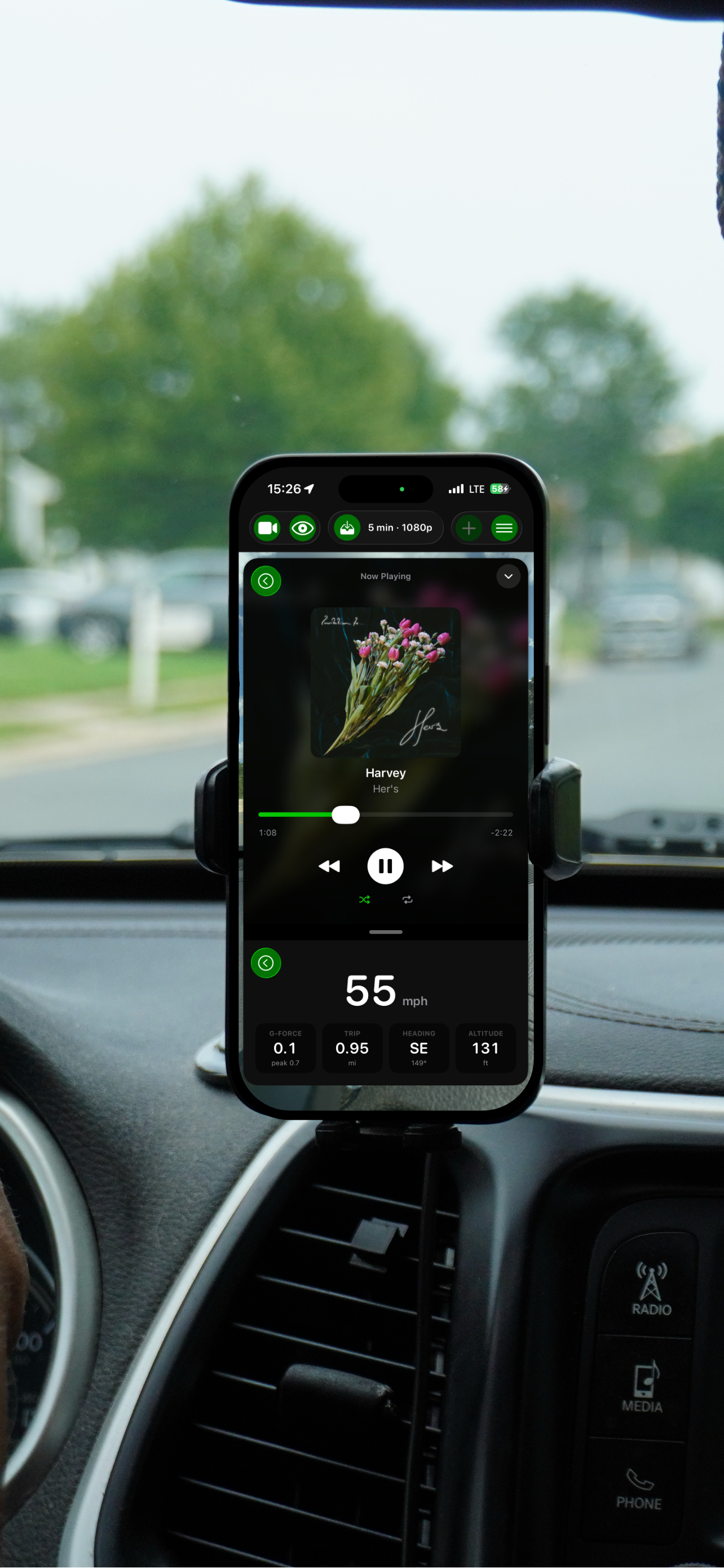 GoDash showing the Now Playing music player above live speed, g-force and heading telemetry